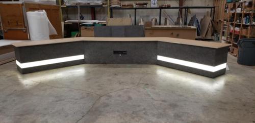Custom Transition Panel Desk with Slate laminate and white LED lights 